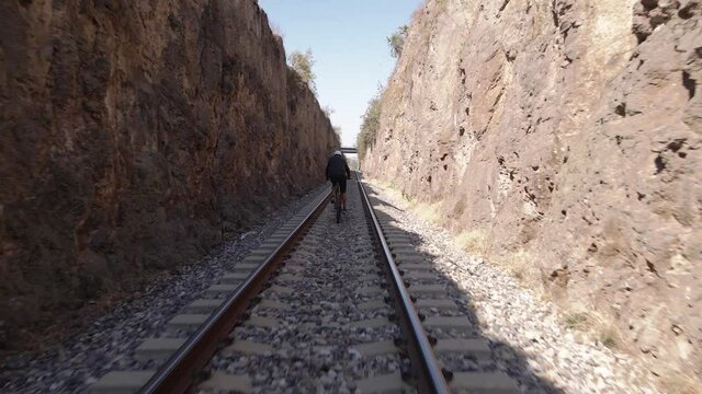 people walking on a train track