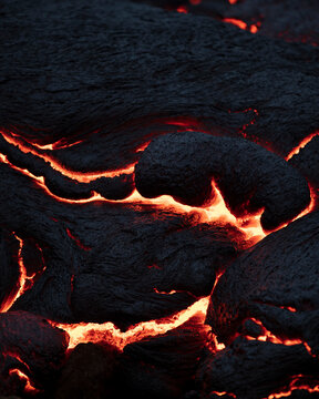 Close-up of fresh lava flowing from volcano eruption in Geldingadalur, Iceland.