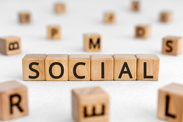 Social - word from wooden blocks with letters, relating to society and living together Social...