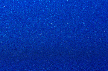 Abstract background blue tones. Glitter texture Christmas background. Defocused abstract holidays...