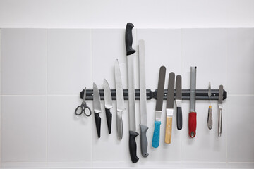 Kitchen tools hanging neatly on the wall
