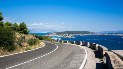 View of the sea bay near Trogir in Croatia from a mountain road.