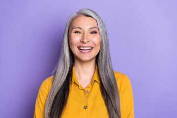 Portrait of attractive cheerful woman laughing good mood isolated over bright violet purple color...