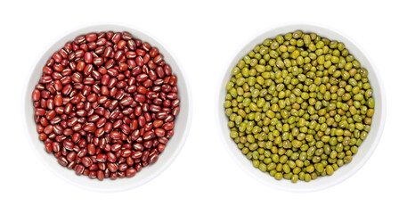 Adzuki beans and mung beans in white bowls. Azuki bean, also called red mung bean, and green gram. Whole, raw seeds of Vigna angularis, and Vigna radiata. Close-up, from above, over white, food photo.