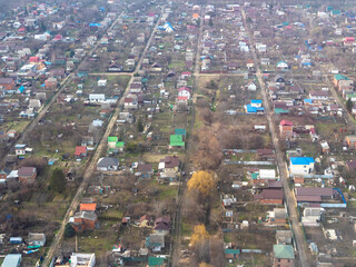 aerial view of suburban cottages and gardens