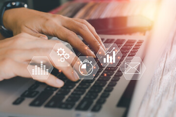 Hi-tech of business and financial concept. Hand typing keyboard of a laptop with a virtual business icon. Digital business and social media interface. Innovation searching, mail.