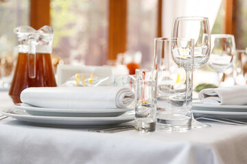Table setting. Restaurant Served table for party in light neutral colors