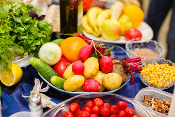 A lot of vegetables and fruits on the table. Proper and healthy food. Vibrant colors