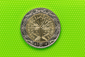Official coin of two euros of the European Economic Community. Legal tender metal coin with different images depending on the country that issues the coin.