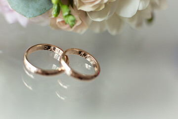 Groom's morning. Wedding accessories. Butterfly-tie, cufflinks, rings and wedding boutonniere