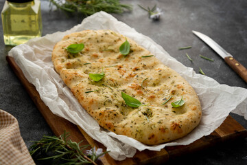 Focaccia bread with rosemary, olive oil. Pita bread or flat bread
