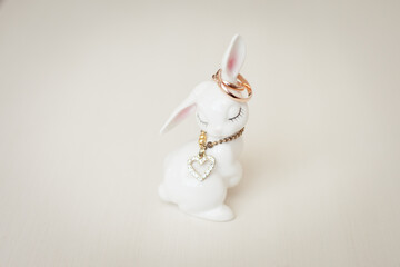 Wedding rings and statuette with little bunny, wedding accessories