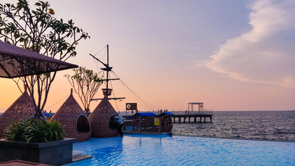 Obraz premium Beautiful Sunset at Ancol beach Jakarta