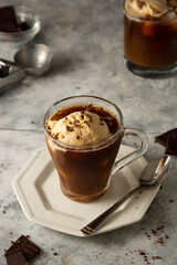 Ice cream with coffee in glass cup. Coffee affogato drink.