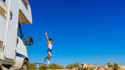 Woman enjoy trip with motorhome