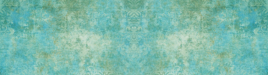 Old blue green vintage shabby patchwork damask ornate motif tiles stone concrete cement wall wallpaper texture background banner panorama long.