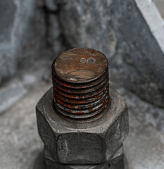 Massive rusted nut and bolt fastener. Close up image.