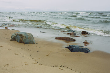 City Tuja, Latvia. Baltic sea beach with sand and rocks. - obrazy, fototapety, plakaty