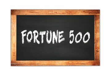 Fototapeta premium FORTUNE 500 text written on wooden frame school blackboard.