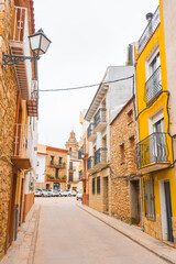 Fototapeta premium Vilanova d'Alcolea, Castellon province, Valencian Community, Spain. Beautiful historic city center. Typical spanish street.