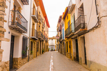 Fototapeta na wymiar Vilanova d'Alcolea, Castellon province, Valencian Community, Spain. Beautiful historic city center. Typical spanish street.
