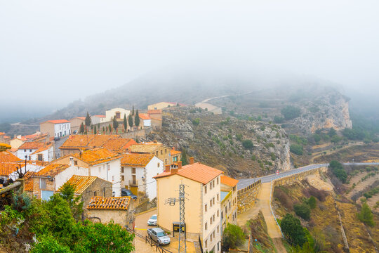 Chodos (Xodos), Castellon province, Valencian Community, Spain. Historic village. Beautiful medieval town on the Penyagolosa mountain in the Alcalat&eacute;n area. Foggy day.