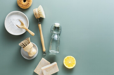 Natural cleaning products, baking soda, wooden brushes, vinegar, lemon, salt, soap. - obrazy, fototapety, plakaty