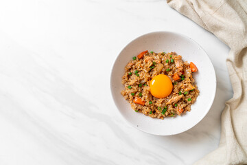 salmon fried rice with pickled egg on top