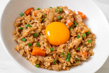 salmon fried rice with pickled egg on top