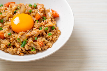 salmon fried rice with pickled egg on top