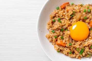 salmon fried rice with pickled egg on top