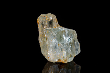 Macro mineral stone Topaz on black background