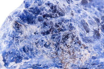 macro mineral sodalite stone on a white background