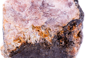 macro mineral andalusite stone on a white background