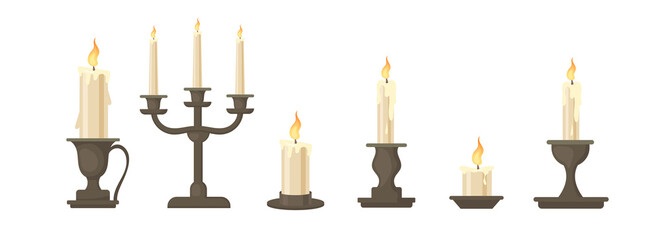 Set of vector cartoon vintage historical candles. Decorative candle for home.  Fire and light. 