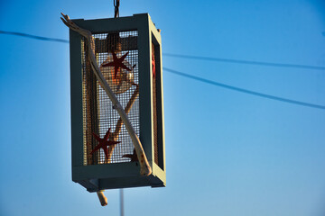 vintage street lamp hanging in the sky