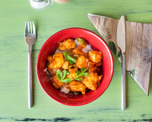 Sweet and sour chicken on rice dish