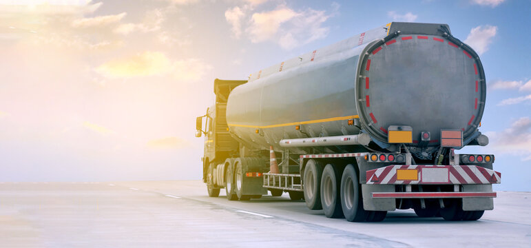 Gas Truck on highway road with tank oil  container, transportation concept.,import,export logistic industrial Transporting Land transport on the expressway with blue sky.image motion blur
