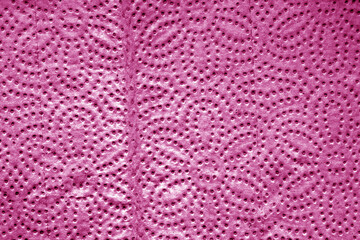 Paper towel tissue texture in pink color.