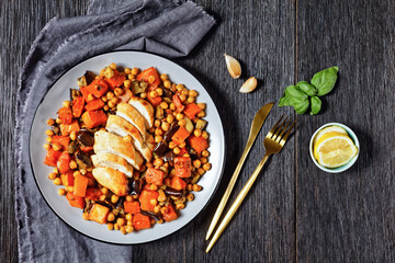 Salad of chickpea, butternut on a plate, top view