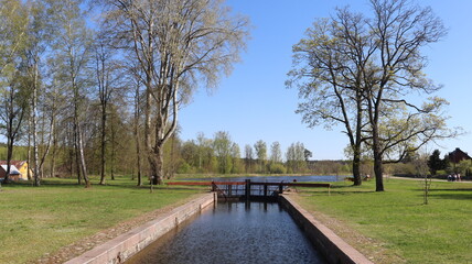 river bridge with sluice and gateway