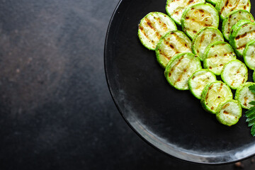 grilled zucchini summer menu vegetables appetizer on the table keto or paleo diet veggie vegan or vegetarian food healthy food meal snack copy space food background rustic. top view