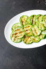 grilled zucchini summer menu vegetables appetizer on the table keto or paleo diet veggie vegan or vegetarian food healthy food meal snack copy space food background rustic. top view