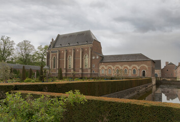 Hoeselt, Limburg - Belgium - 13.05.2021. Old castle Alden Biesen. Part of the composition view of the castle