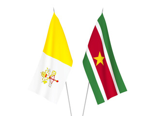 National fabric flags of Vatican and Suriname isolated on white background. 3d rendering illustration.