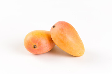 Ripe fresh mango fruit isolated on white background