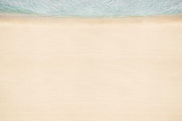 Top and aerial view on tropical sand beach with sea. Ocean coastline. Drone photo. Background