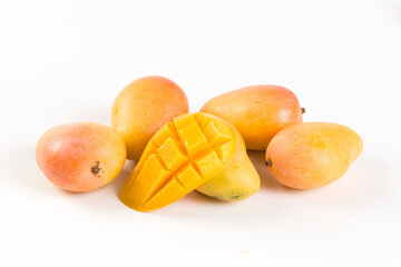 Ripe fresh mango fruit isolated on white background