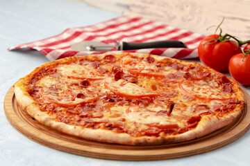 Freshly baked pizza on table close up