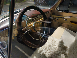 Old restored soviet car on the city street